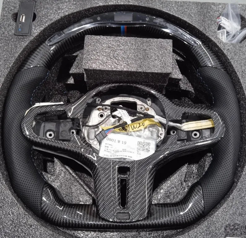 Black carbon fibre BMW steering wheel with integrated LED controls for X3 X5 models