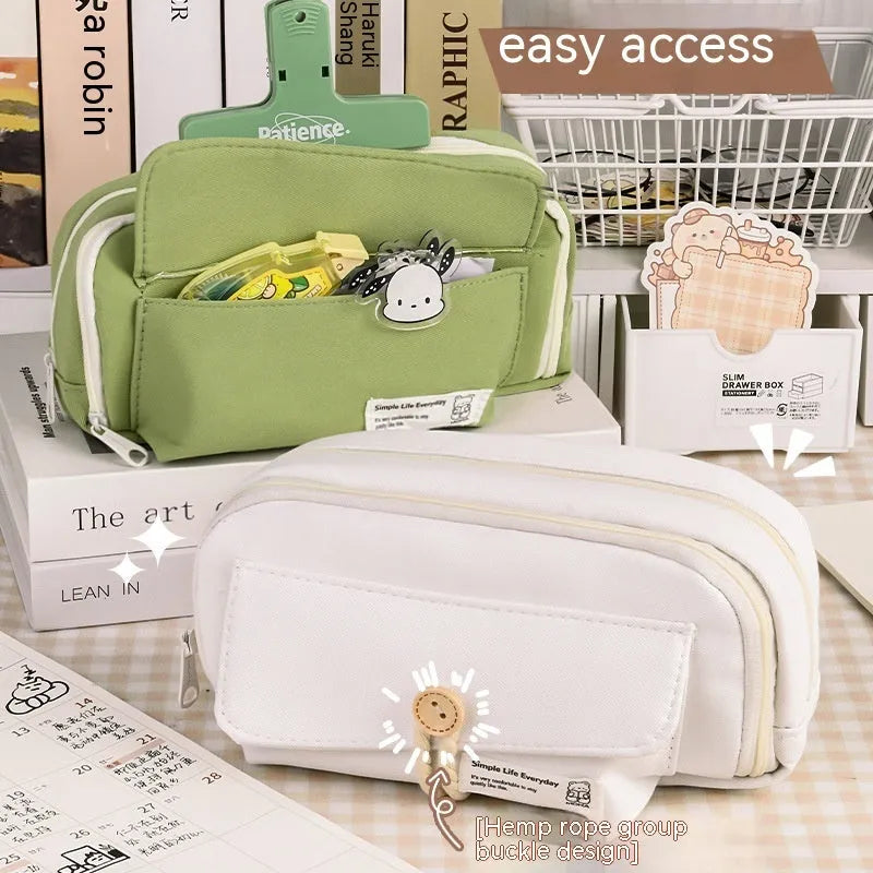 Korean style canvas pencil case in green, beige, blue, or grey, showing large capacity for pens.
