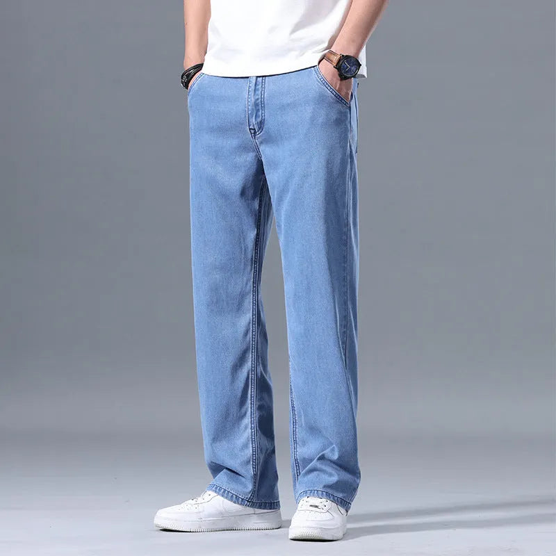 Men's loose straight-leg lyocell jeans in light blue colour with zipper fly