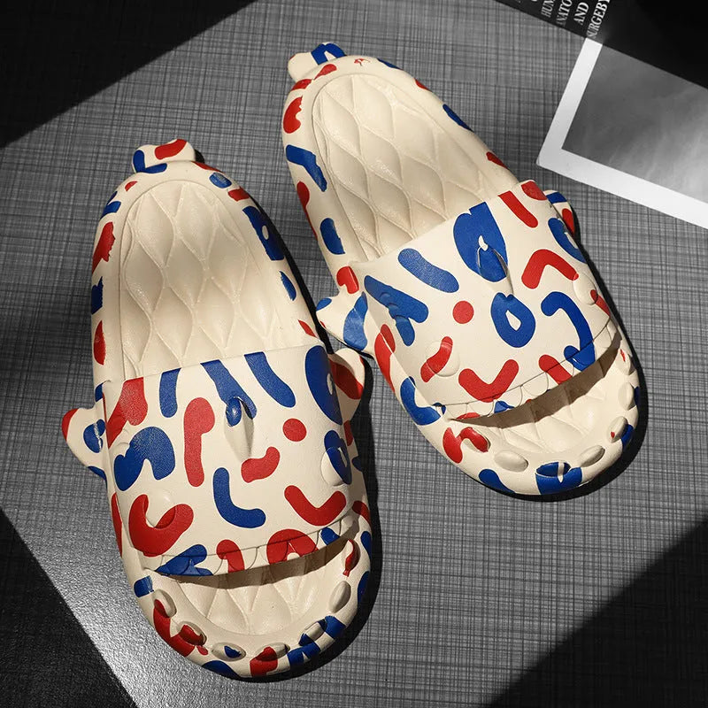 Beige EVA open-toe home slipper with a cute cartoon shark couple design on the footbed.