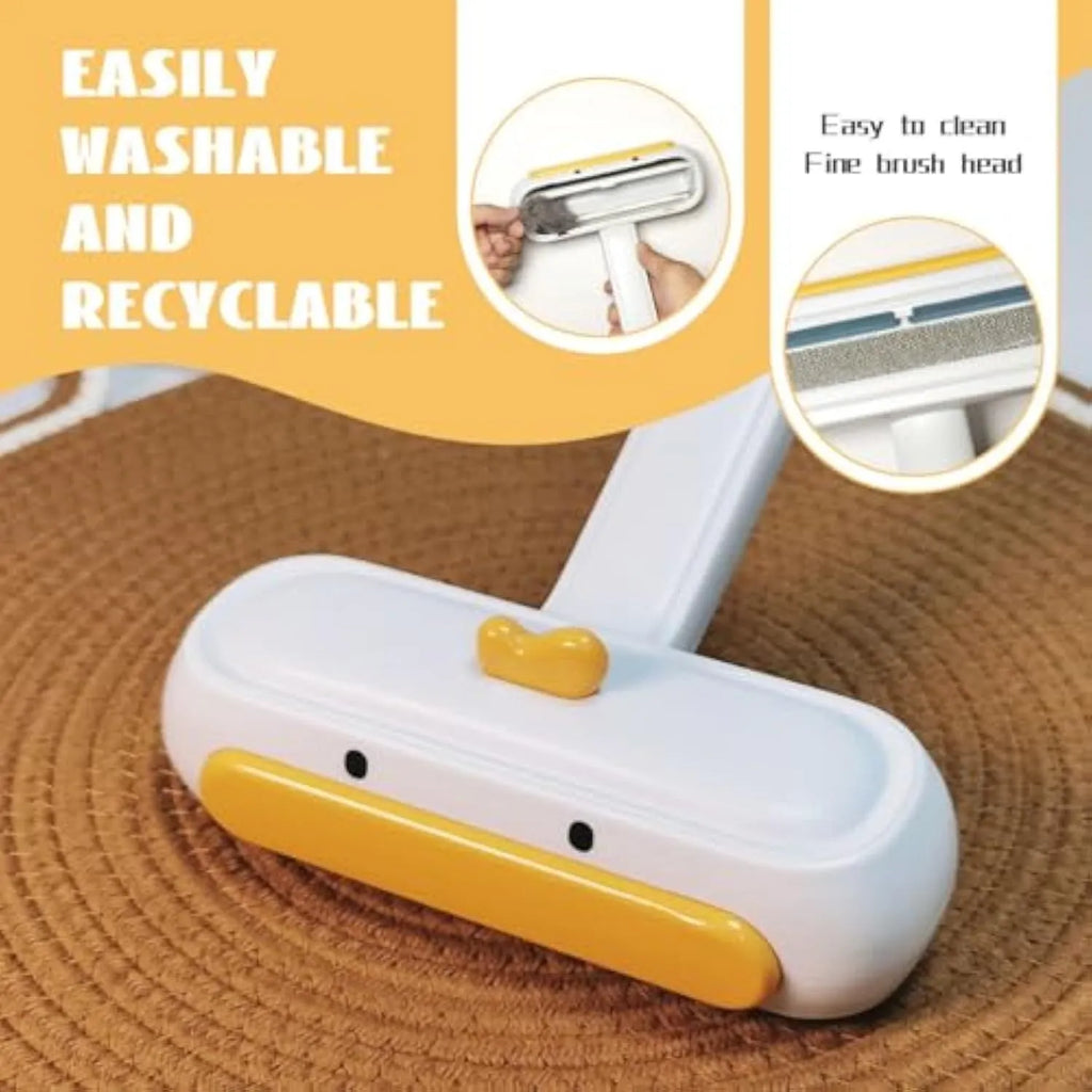Portable pet hair brush with yellow duck design showing removable lid and polyester bristles