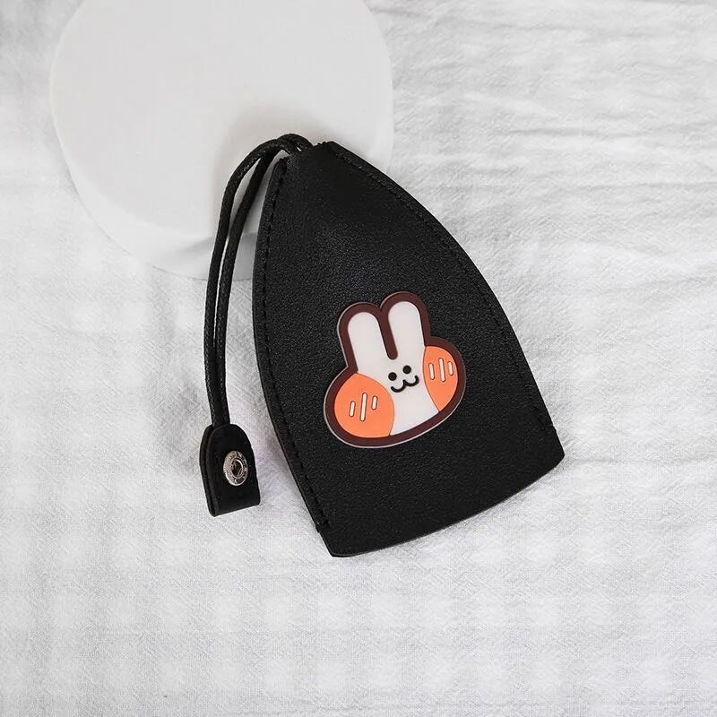 Colourful cartoon pull-out key case made from PU leather, showing the key extended from its protective sleeve.
