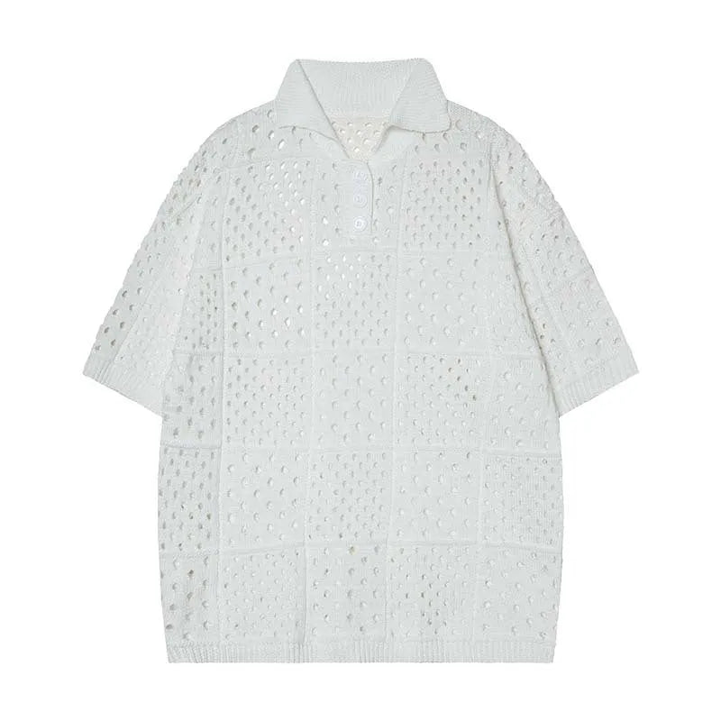 Black and white loose-fit cardigan-style short-sleeved polo shirt for teenagers on a hanger.
