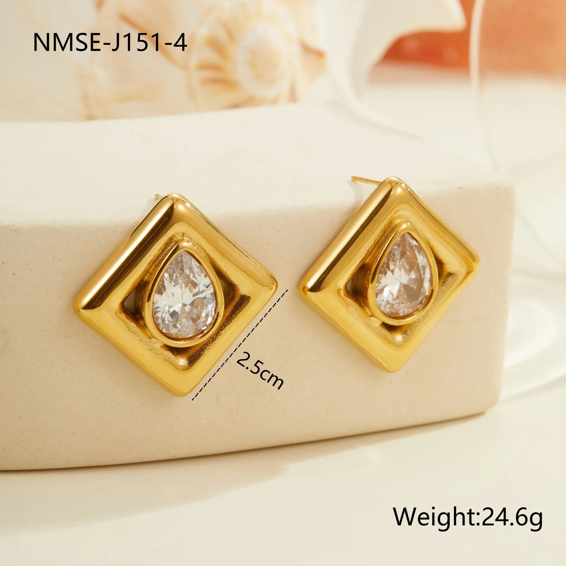 Gold-coloured geometry stud earrings with inlaid water drop zircon stones on a stainless steel base.