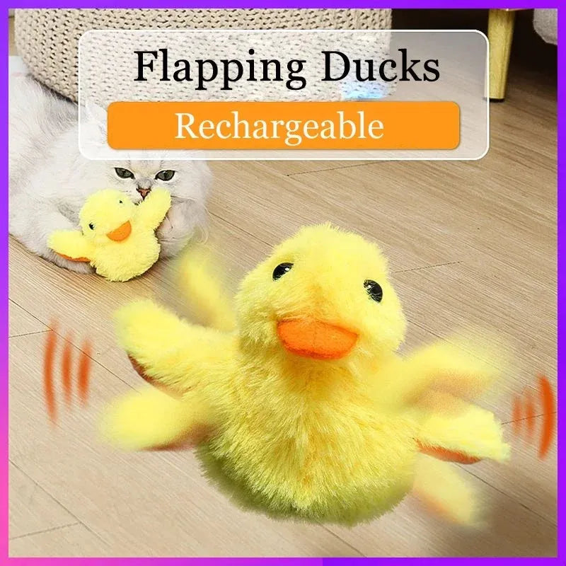 Yellow chick-shaped flapping duck cat toy with plush fabric on a floor.