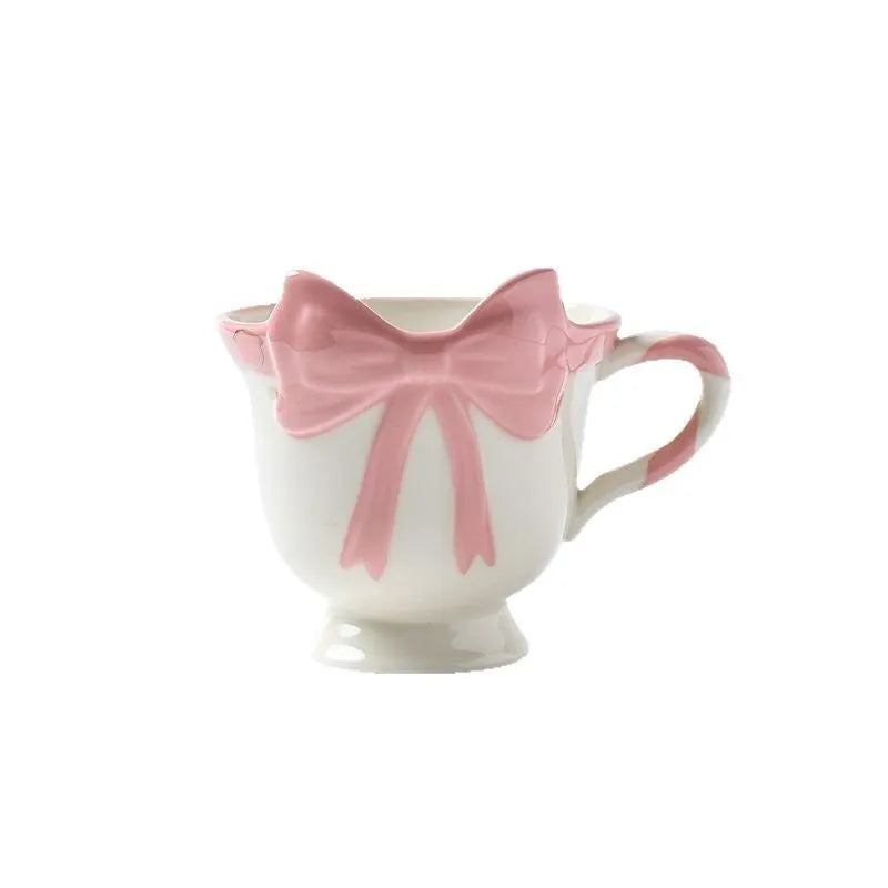 Ceramic mug with heart bow design in black pink or white powder, 301-400ml capacity