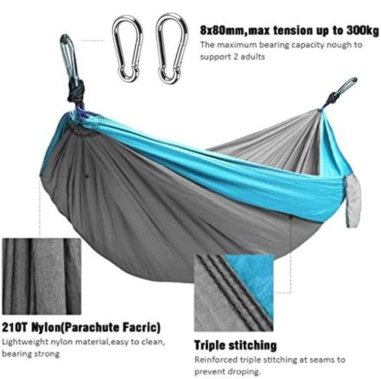 Blue nylon parachute cloth camping hammock measuring 270x140cm suspended outdoors