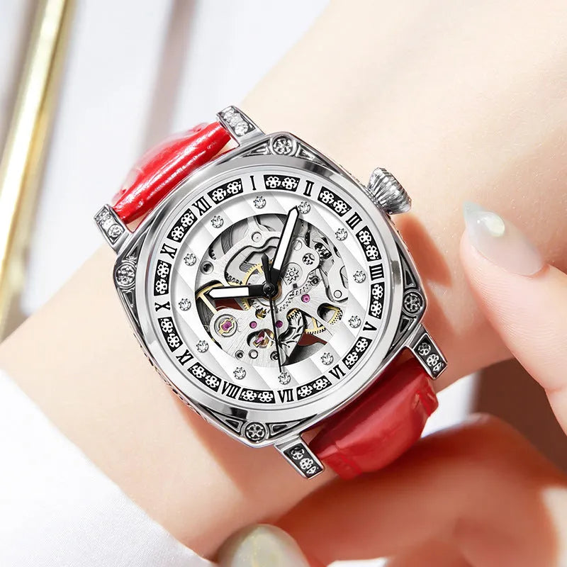 Mechanical wristwatch with luminous dial on leather strap, available in multiple colours including black, red and white