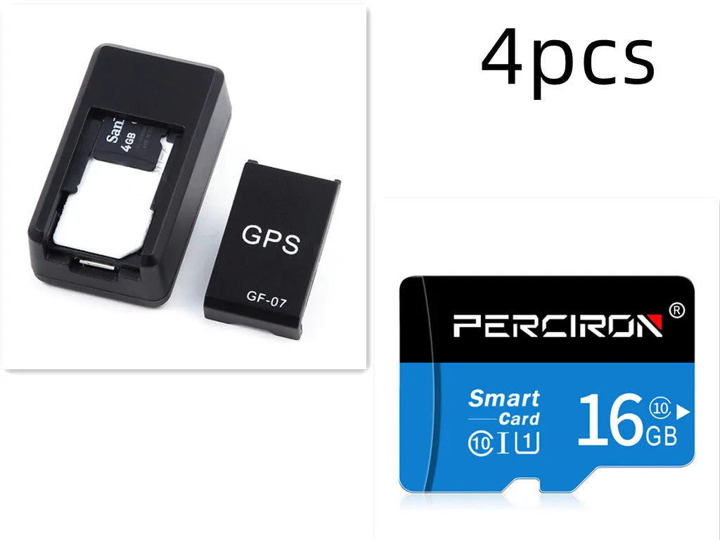 Black mini magnetic GPS tracker next to USB charging cable on a dark surface.