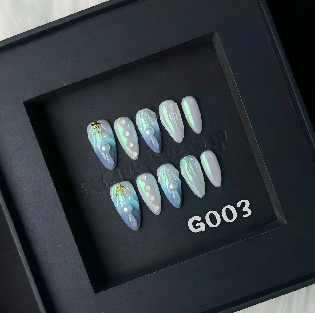 Blue plastic false nail shells for women in XS, S, M, and L sizes.