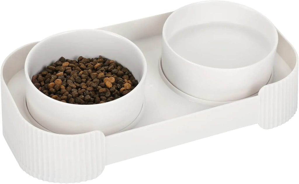 Green and white ceramic elevated cat bowls on a tilted stand with non-slip base
