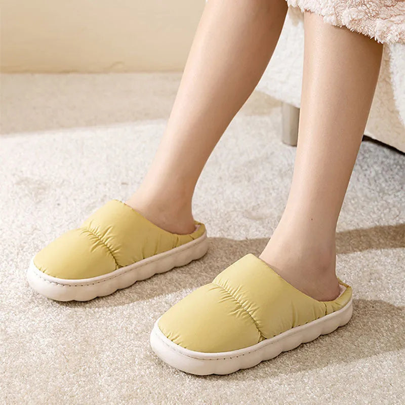 Blue couple's winter slippers with artificial leather upper, plush lining, and thick rubber anti-slip sole.