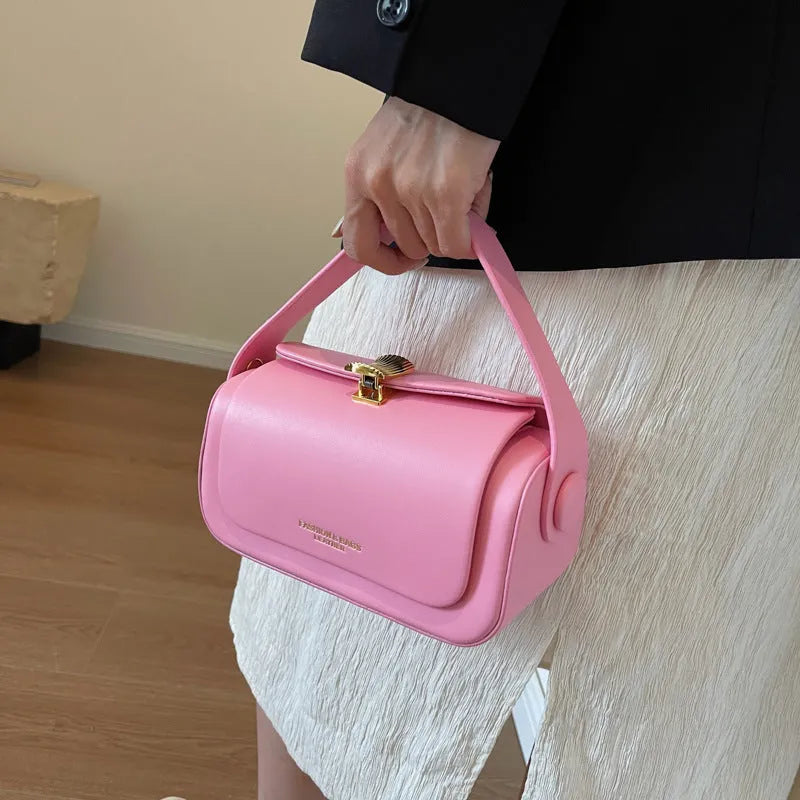 Women's personalised PU leather shoulder messenger bag in black, beige, pink, or khaki with lettering detail.