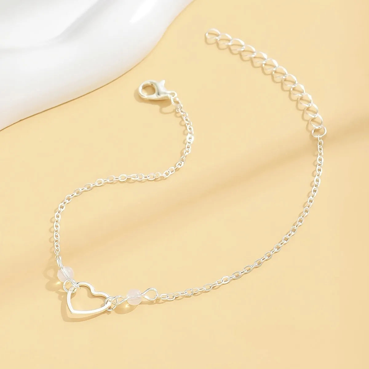 Women's adjustable anklet with heart pendant in gold or silver alloy jewellery