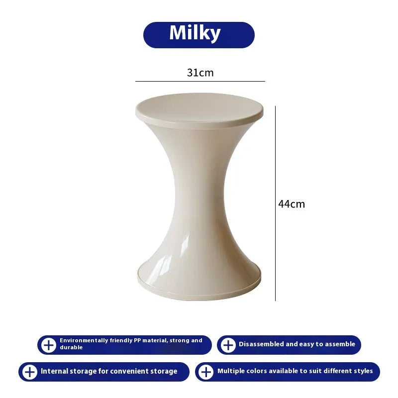 A plastic hourglass-style shoe changing stool in one of five available colours: black, green, red, white, or brown.