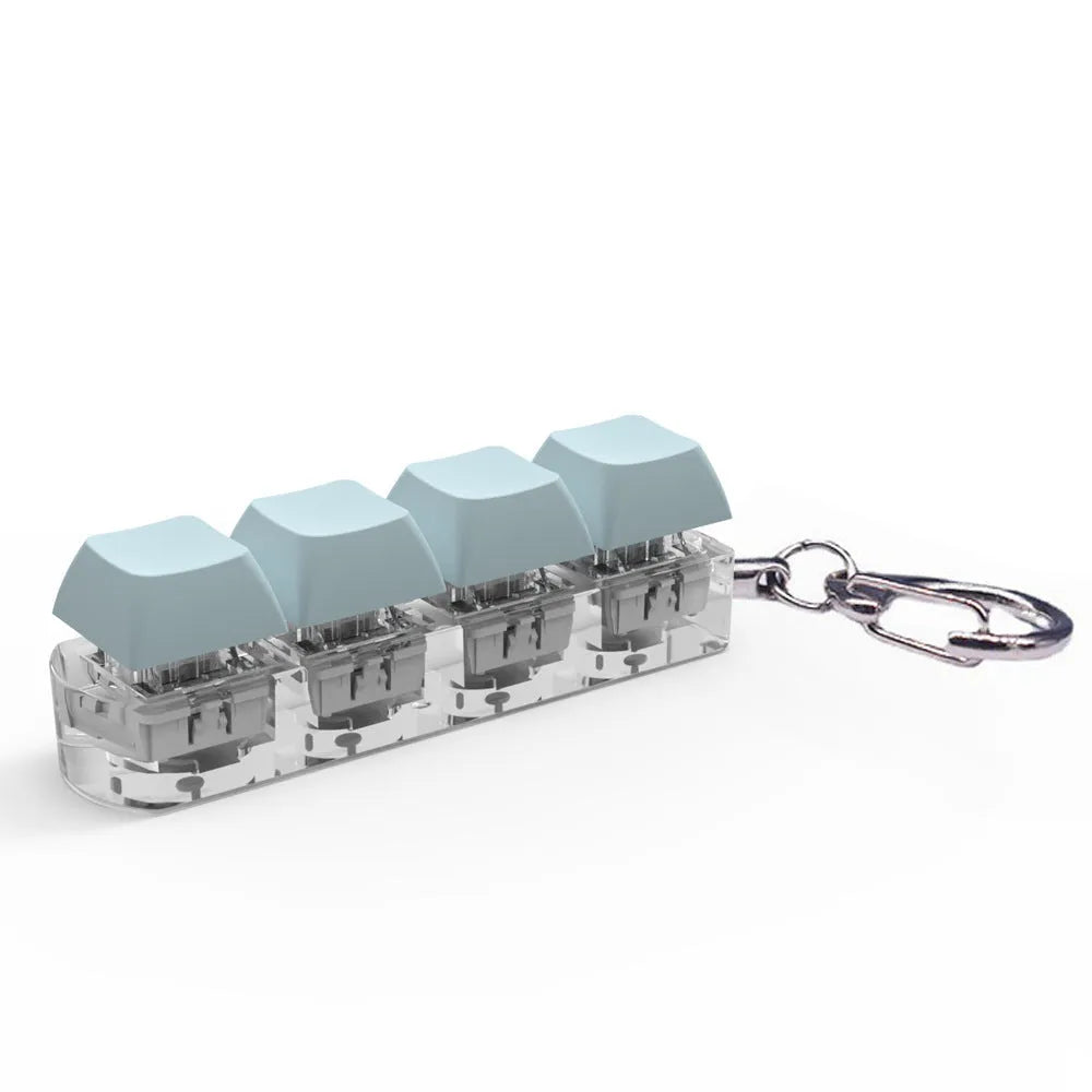 4-key keyboard switch shaft tester with transparent bottom shell showing switch sockets