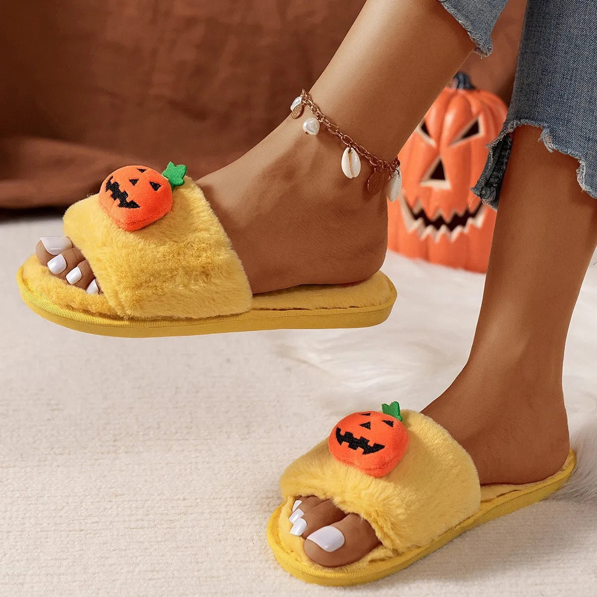 Pumpkin design plush slippers with synthetic fur upper and anti-slip soles in white or yellow