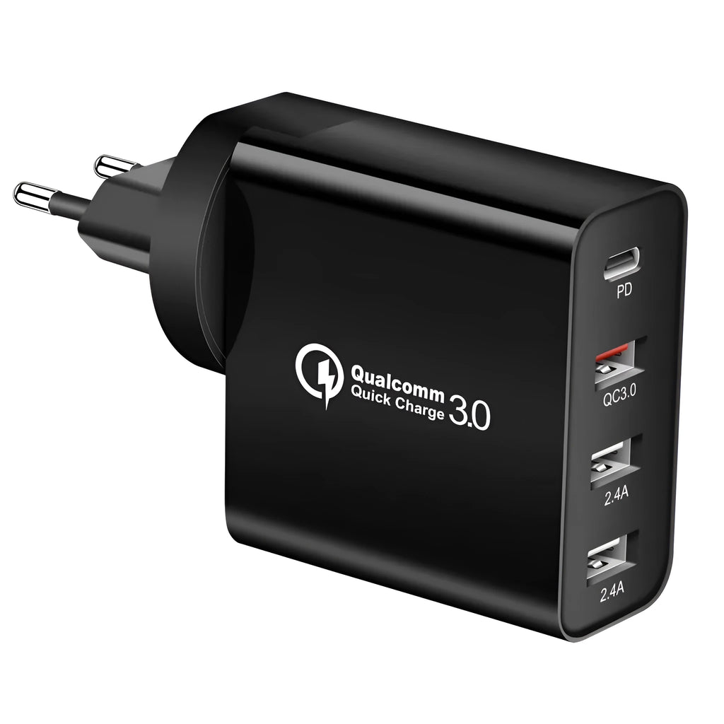 White 4-port fast wall charger with PD, QC, and USB ports on a table
