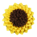 Yellow sunflower shaped dog snuffle mat with fleece petals for treat hiding games