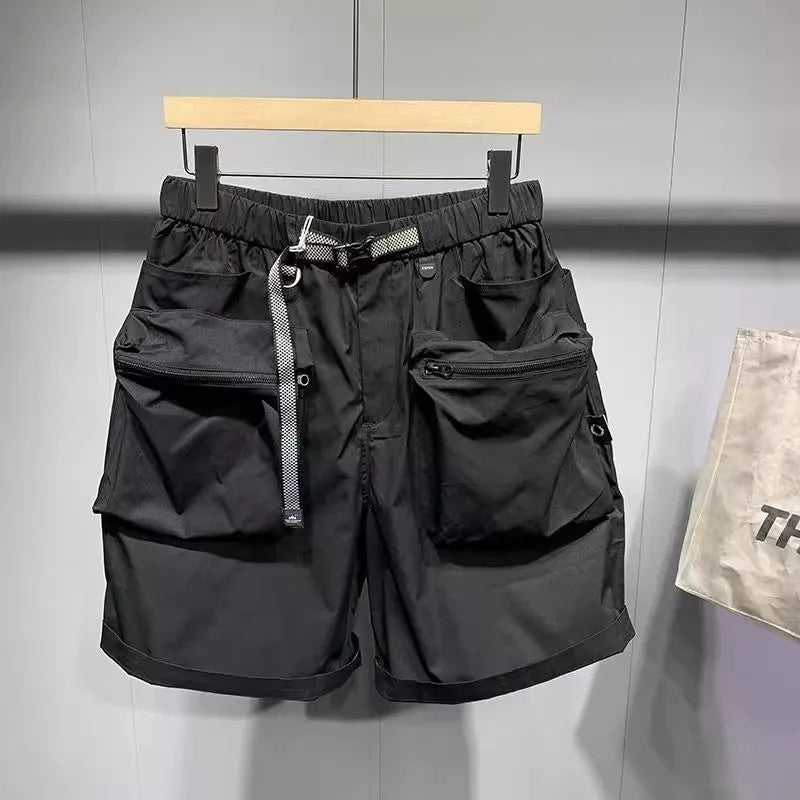 Men's black loose-fit workwear shorts with pockets in above-knee length
