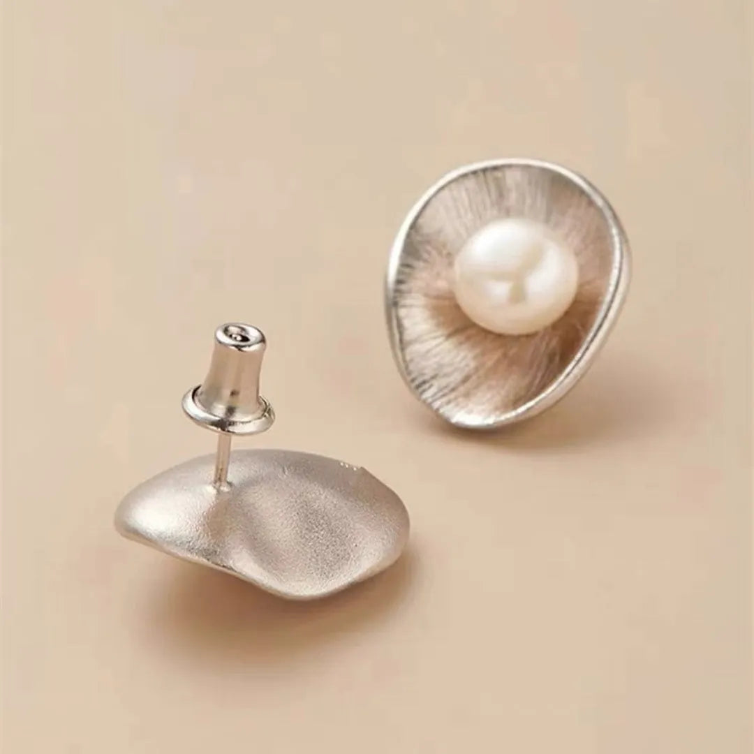Pearl sterling silver needle earrings with geometric design and electroplated gold finish