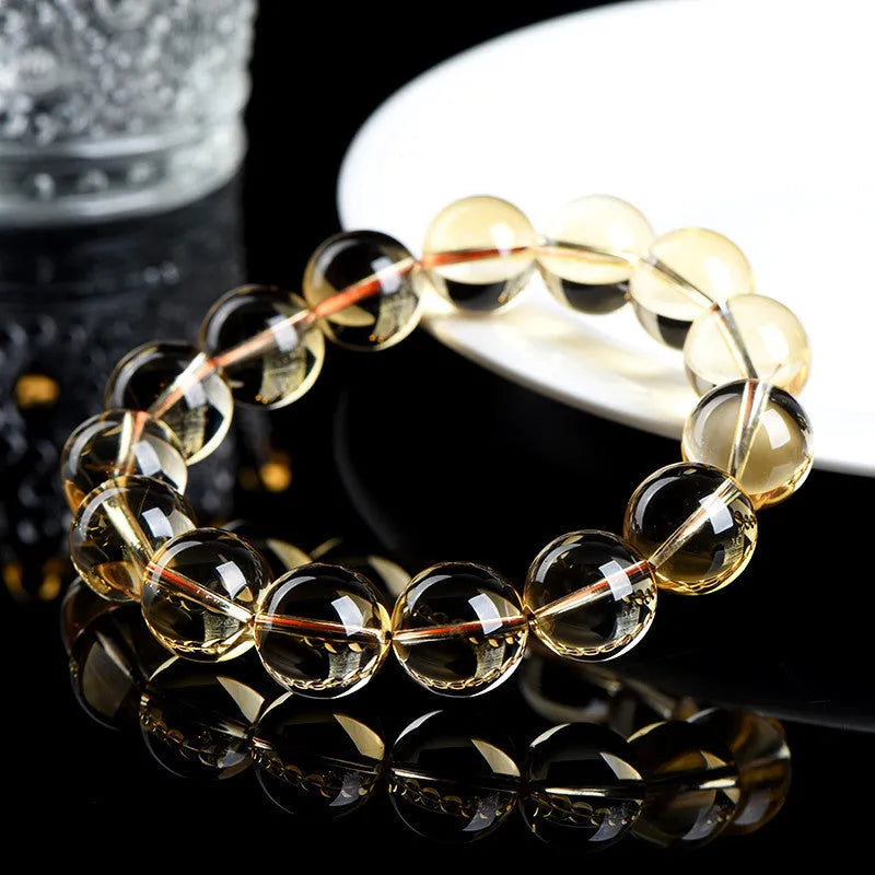 Natural citrine scattered bead bracelet showing polished stones in warm tones