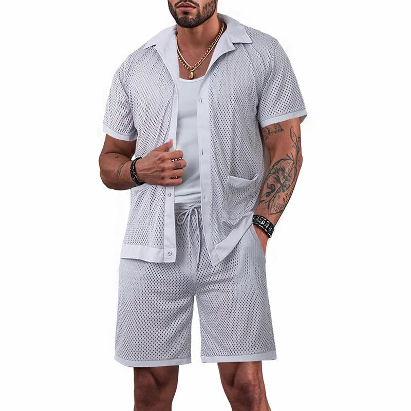 A woman wearing a light blue see-through cardigan and matching shorts from the Hawaii beach set.