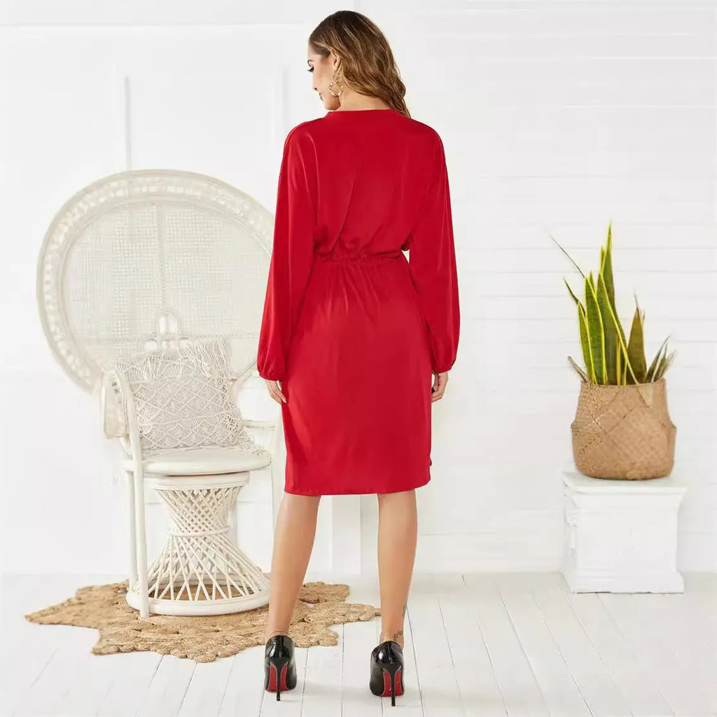A-line midi dress with elastic waist, long sleeves, and a cinched belt in black and red colour options