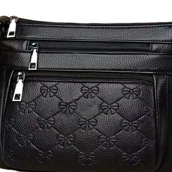 Butterfly Black PU shoulder messenger bag with embossed detail and horizontal square shape