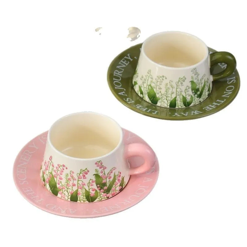 Ceramic coffee cup and saucer set with two cups, two saucers and two stirring spoons