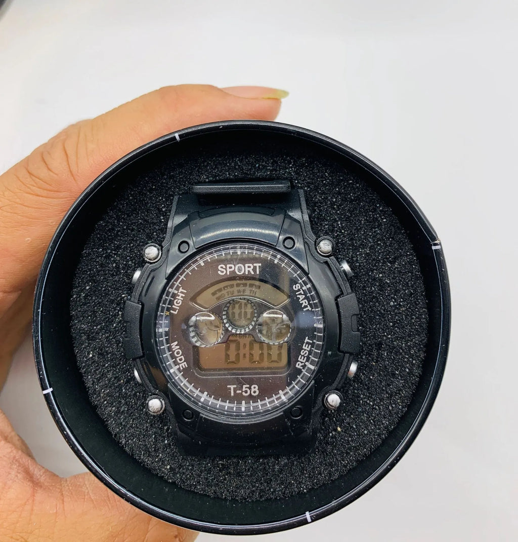 Digital sports watch for students with silicone strap, plastic case, and alarm display