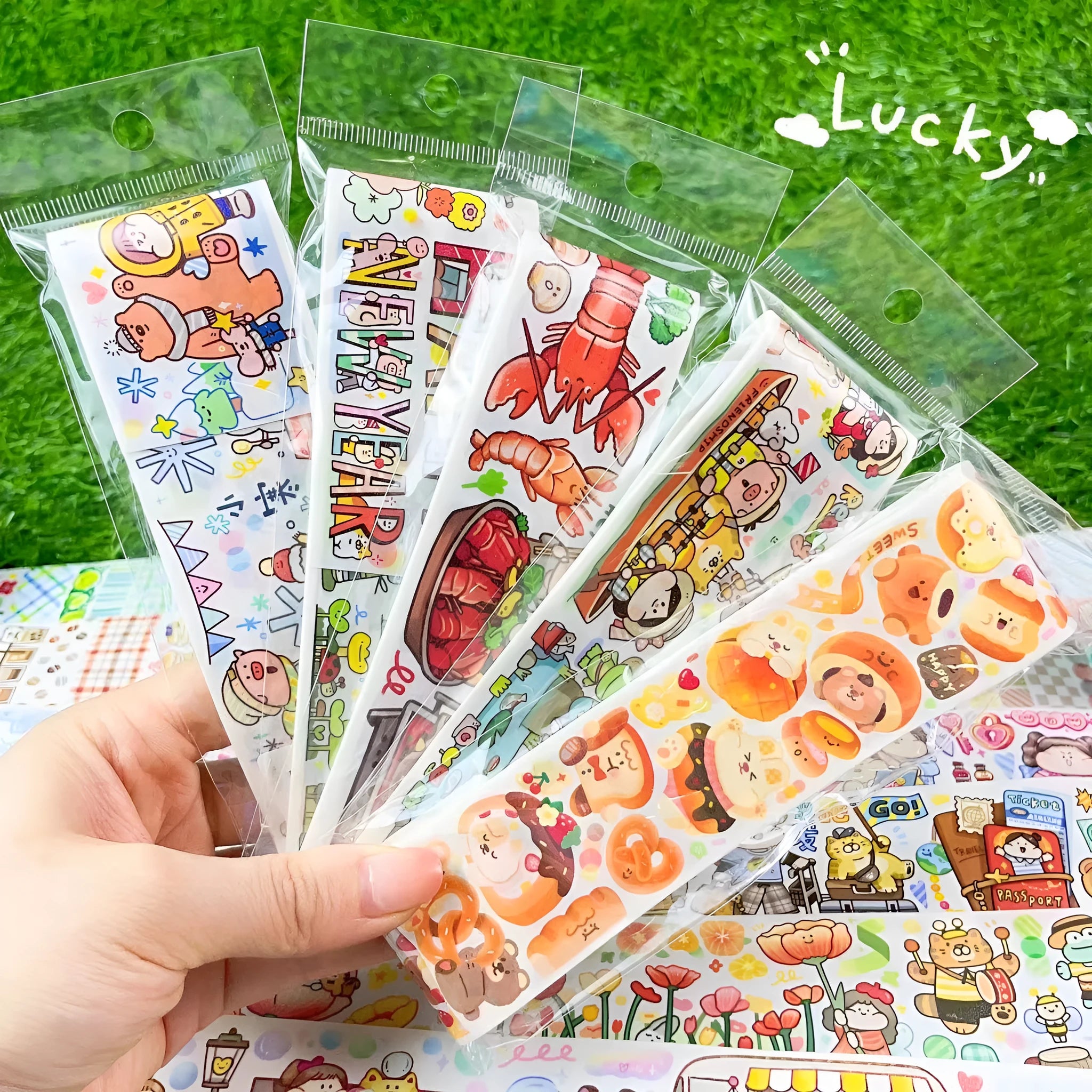 Sheet of cute cartoon character stickers printed on Japanese paper for packaging decoration.