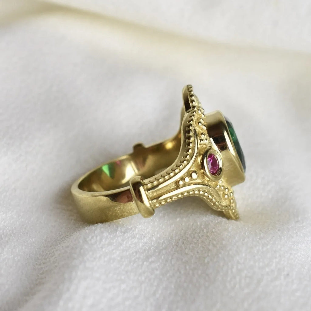 Golden geometric women's fashion ring on display showing electroplated finish and geometric design details