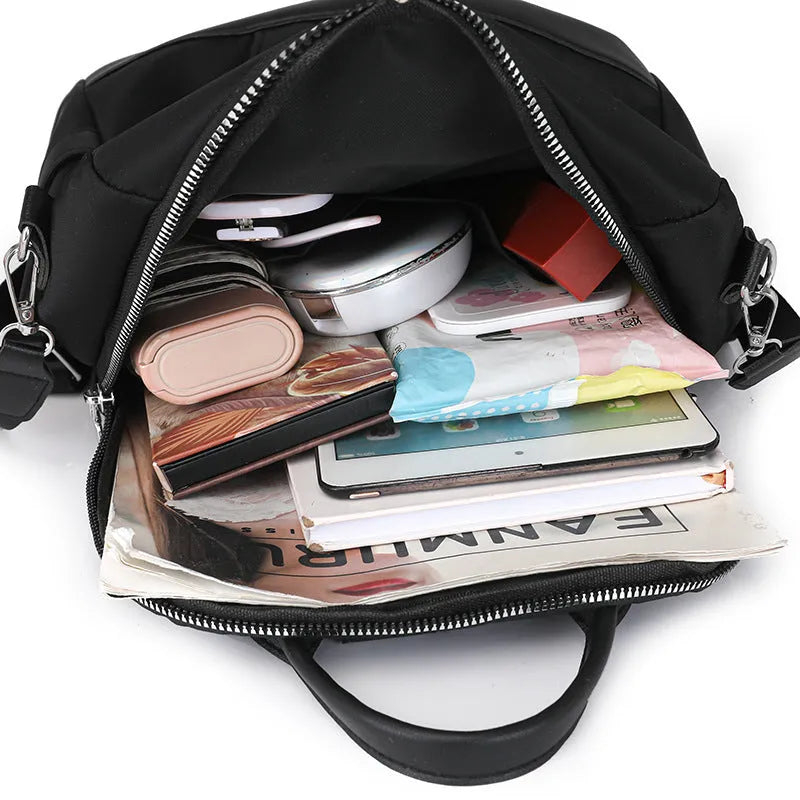 Simple commute backpack in soft PU material with three-dimensional pockets and urban design