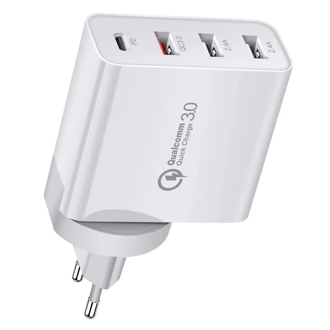 White 4-port fast wall charger with PD, QC, and USB ports on a table