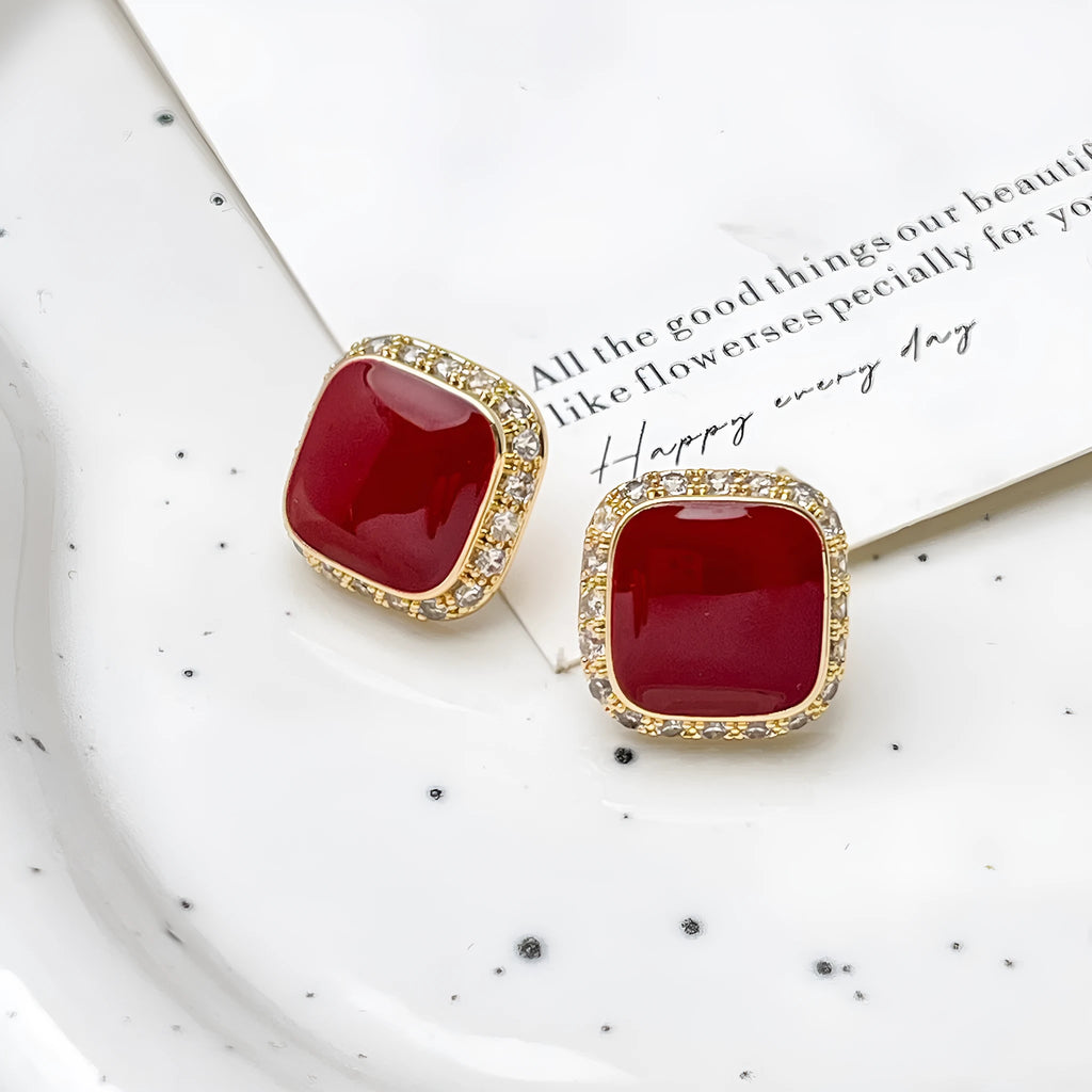 Red geometric square earrings with alloy construction and inlaid design detail