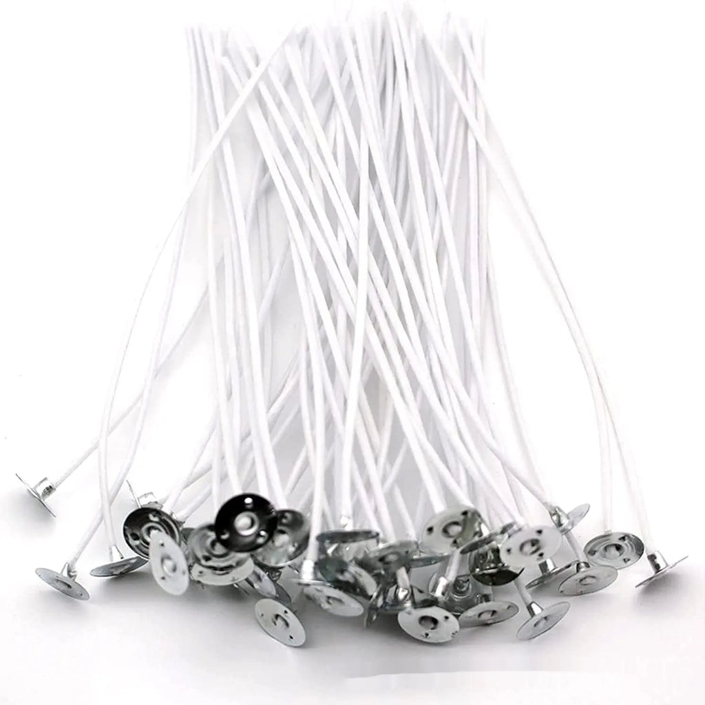 White cotton candle wicks showing three different lengths: 2.6cm, 6cm and 8cm for DIY candle making