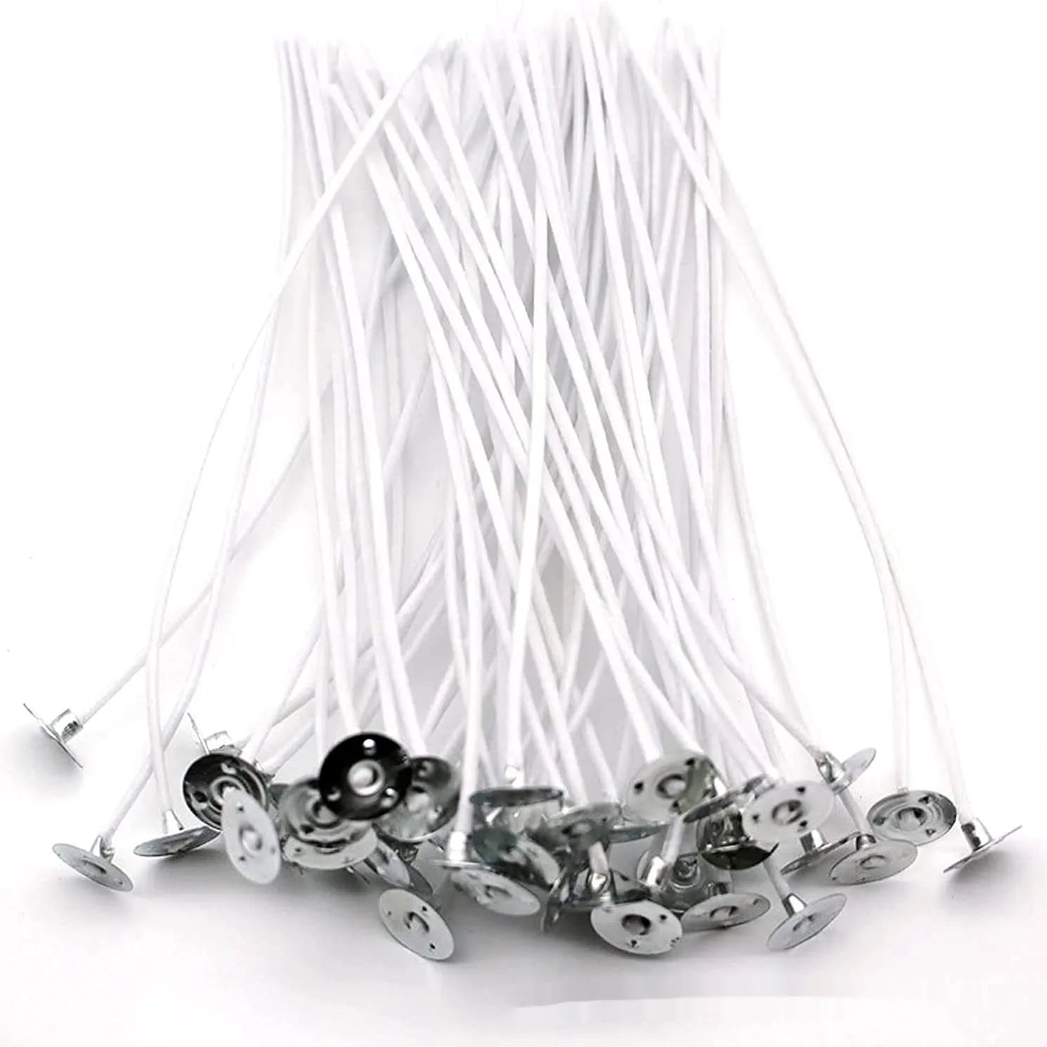 White cotton candle wicks showing three different lengths: 2.6cm, 6cm and 8cm for DIY candle making