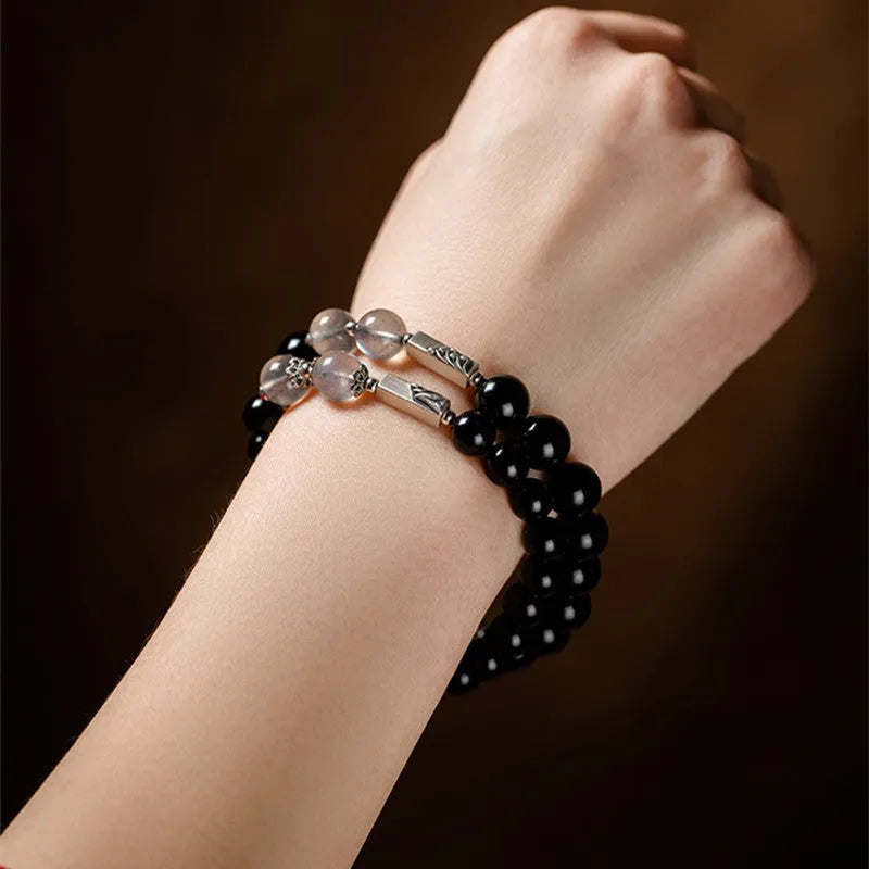 Obsidian Buddha beads couple bracelet DIY set showing 10mm men's and 8mm women's sizes in national style