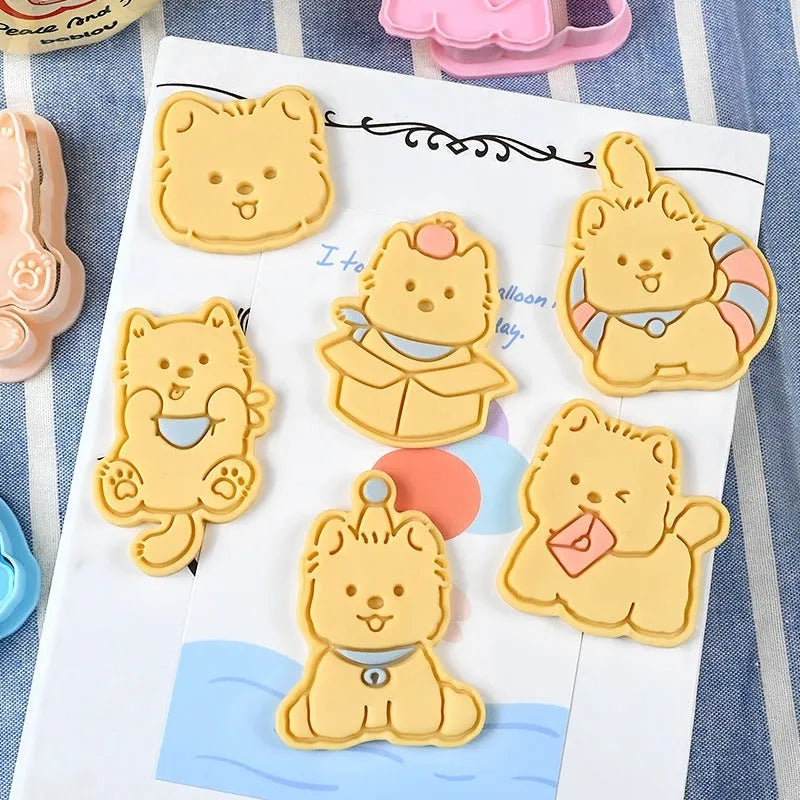 Three-dimensional plastic biscuit mould with puppy cartoon designs for making decorated dog-themed cookies and candies