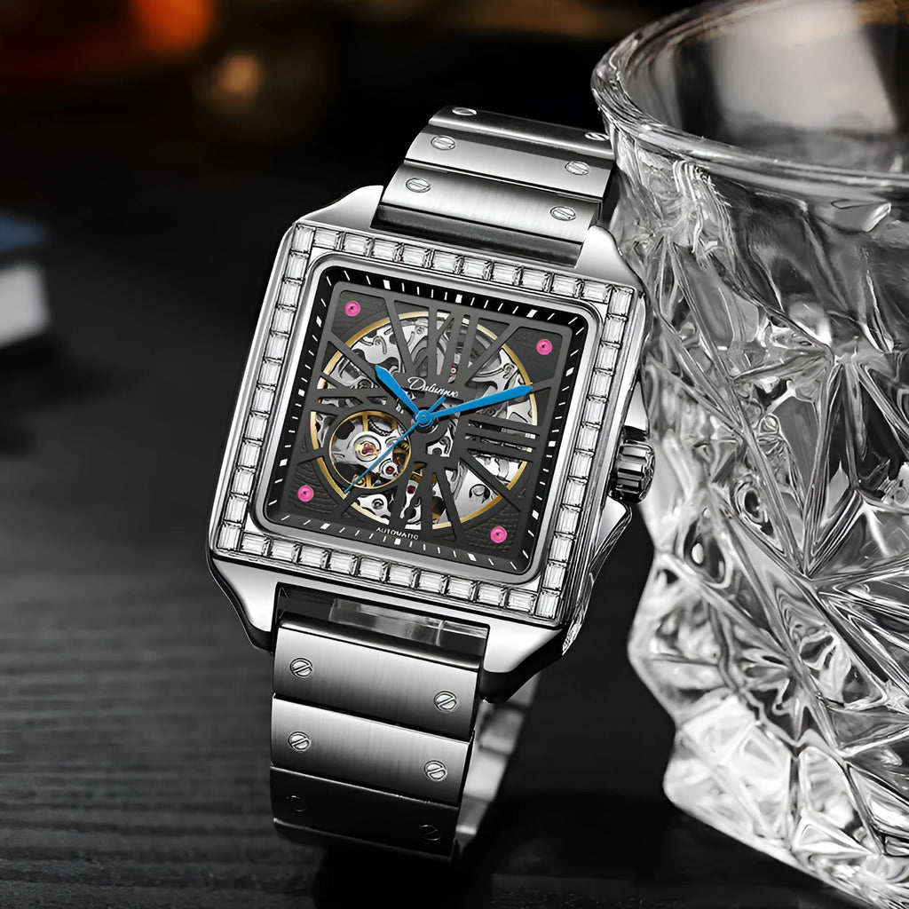 Men's square-faced automatic watch with diamond-studded bezel on a black leather strap