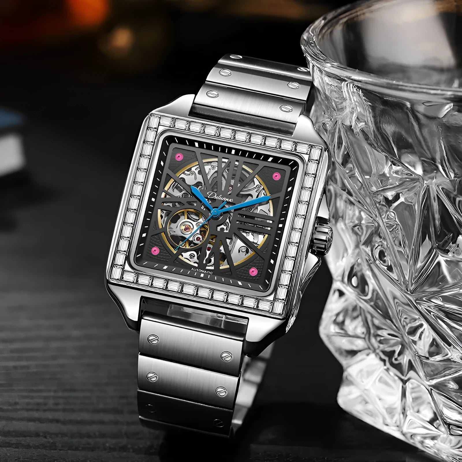 Men's square-faced automatic watch with diamond-studded bezel on a black leather strap