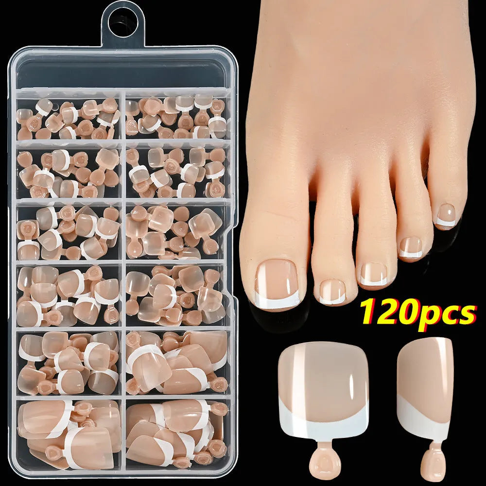 Box of 120 French white edge nude full square short artificial nail pieces showing nine colour shades