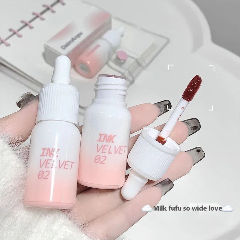 Mirror Lip Lacquer tube showing four shade options including Orange Tabby Cat Diary and Misty Berry