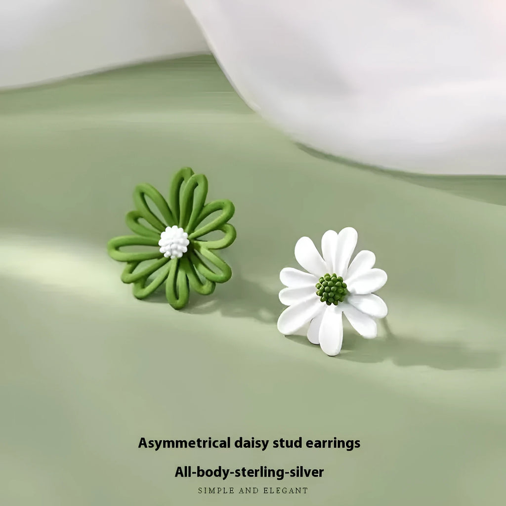A pair of cartoon-style flower stud earrings made from alloy, showing a blue and orange two-tone colour variation.