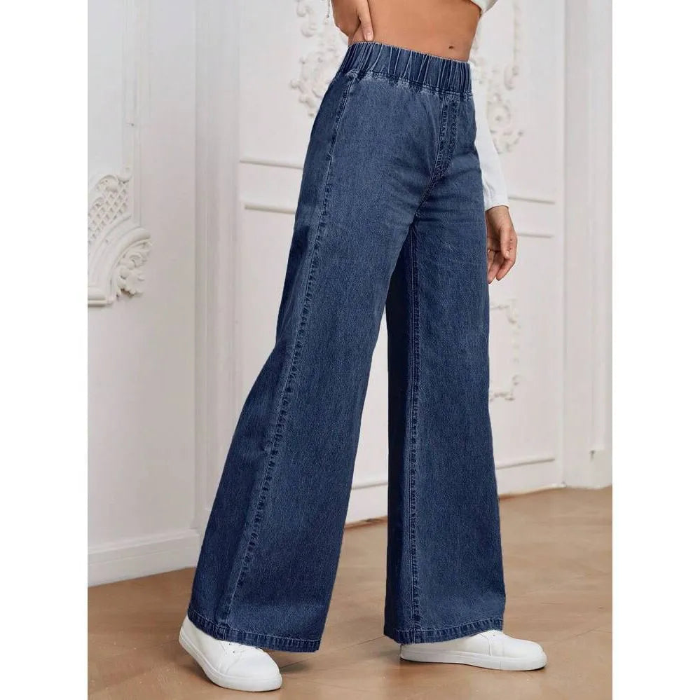 Light blue washed wide-leg jeans on a hanger, showing the straight-leg silhouette and mid-waist design.