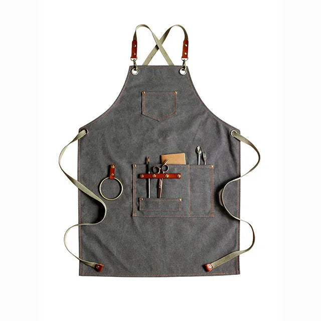 Canvas apron with cross-strap back design in camel colour for work protection