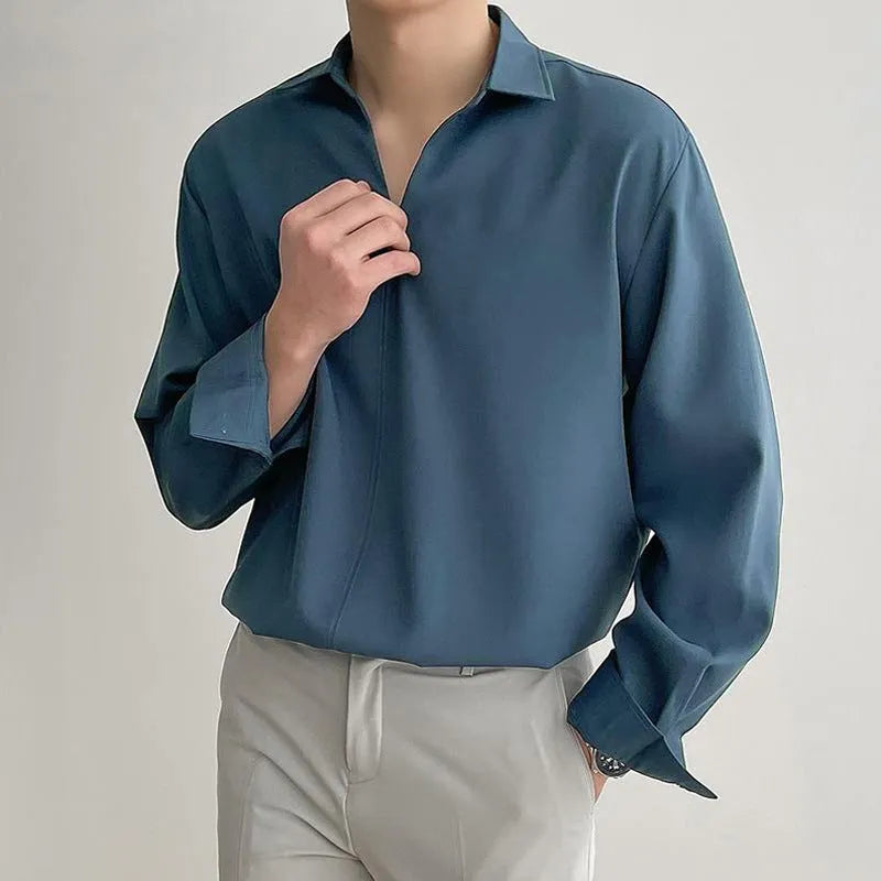 Men's loose lapel casual shirt in polyester blend available in four colours with non-ironing properties