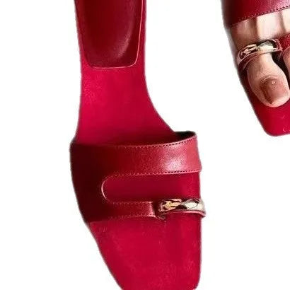 Square toe leather outdoor slipper in multiple colours on a plain background.