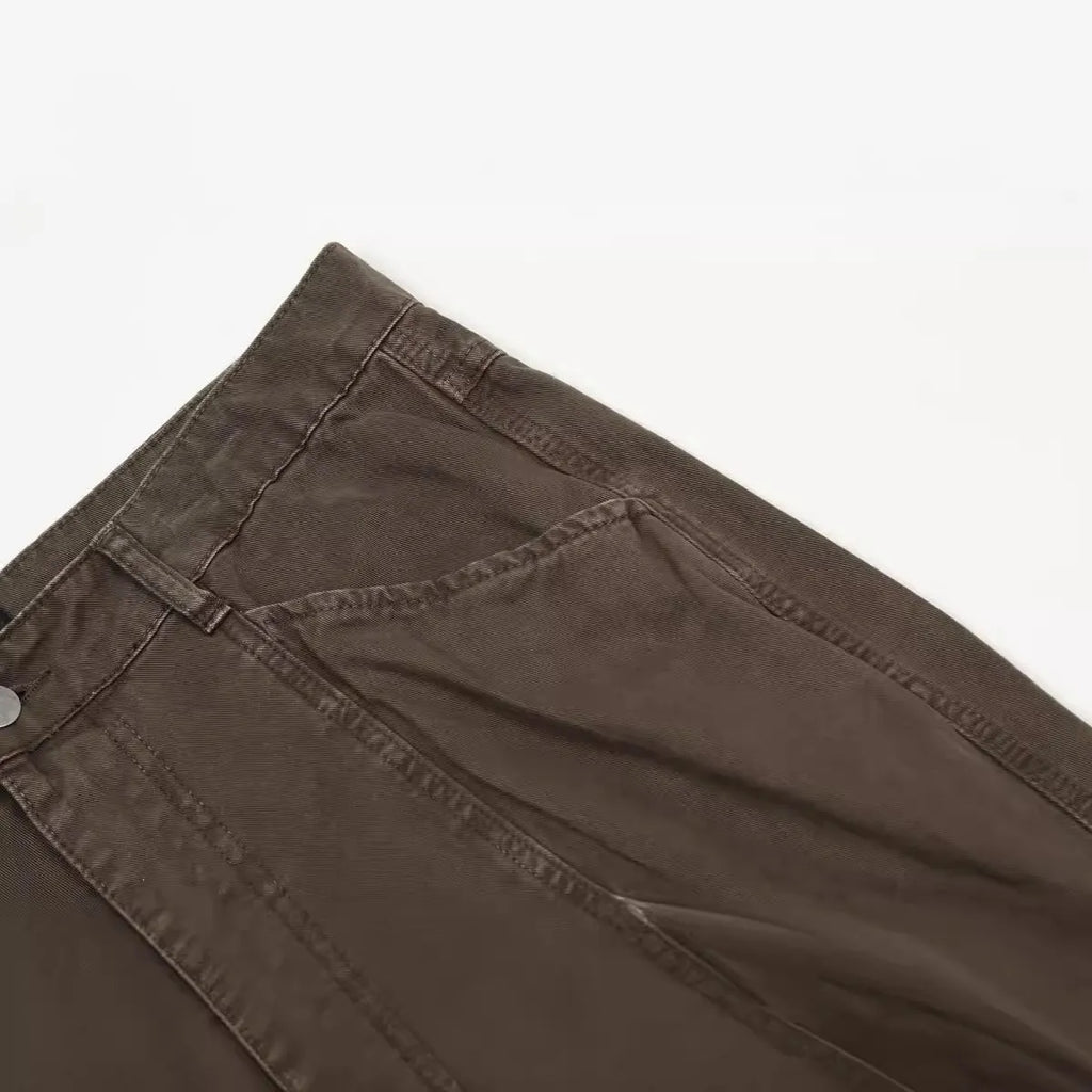 Men's brown straight leg cotton jeans with high waist and zipper fly closure